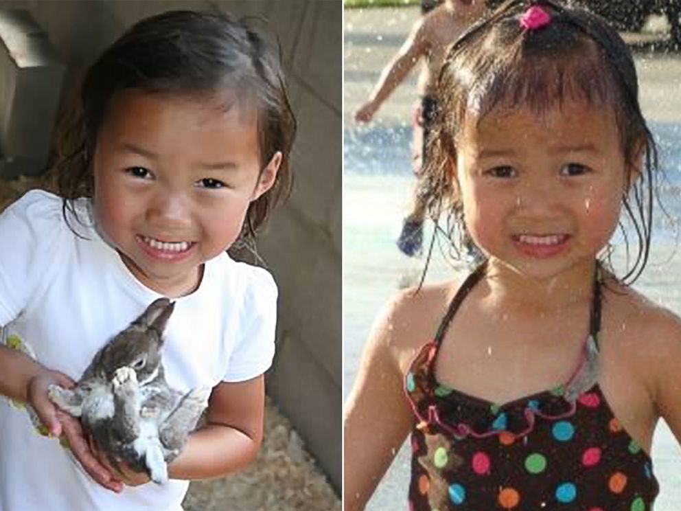 PHOTO: The two share a similar smile. Audrey Doering, pictured left at age 4, holds a bunny, and Gracie Rainsberry, pictured right at age 3, plays in a fountain.