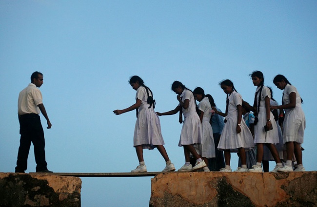 281555 R3L8T8D 650 children going to school around the world 37