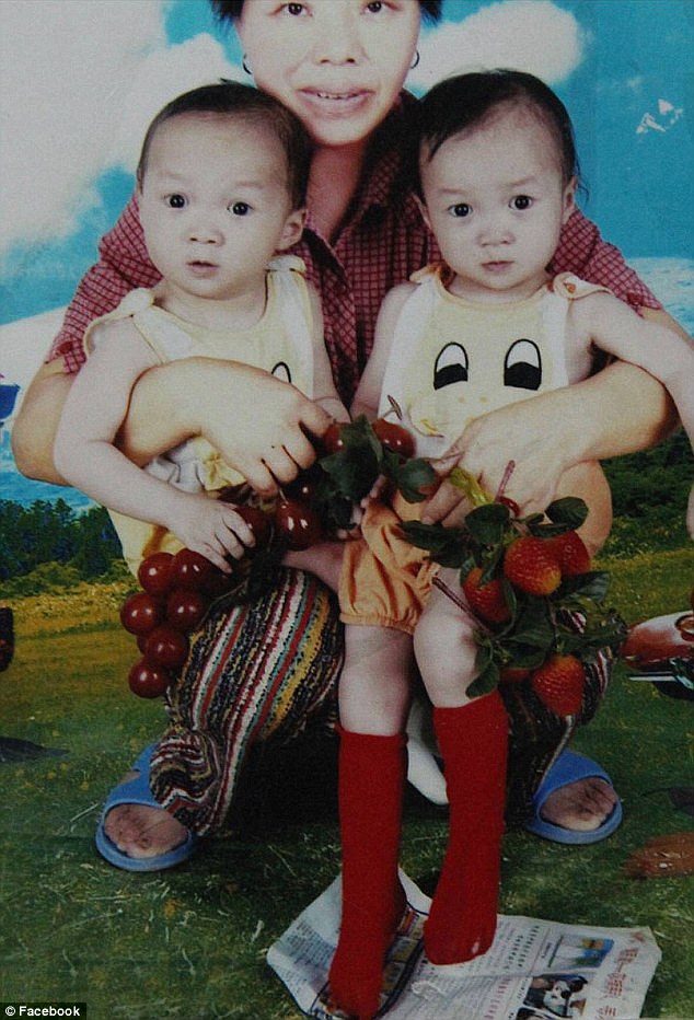 This photo, which shows the two girls as babies with their Chinese foster mother, led Audrey