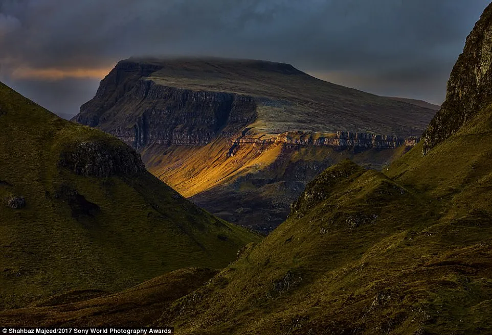 Scotland looks beguiling dramatic in this shot by Shahbaz Majeed. He said he grabbed this shot with his zoom lens to focus on the light hitting the peak in the distance