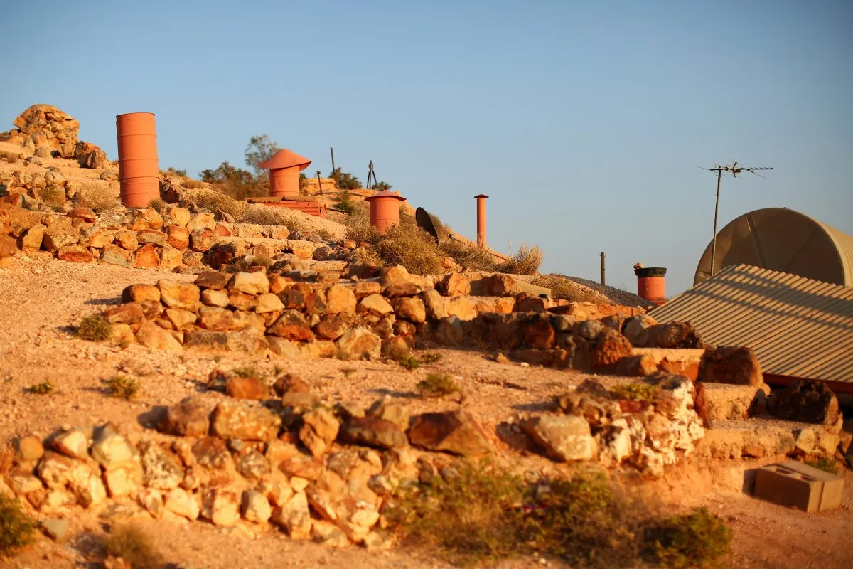 As opal mining settled into a steady (but less booming) business, Coober Pedy residents began turning discarded opal mines into permanent dugouts.