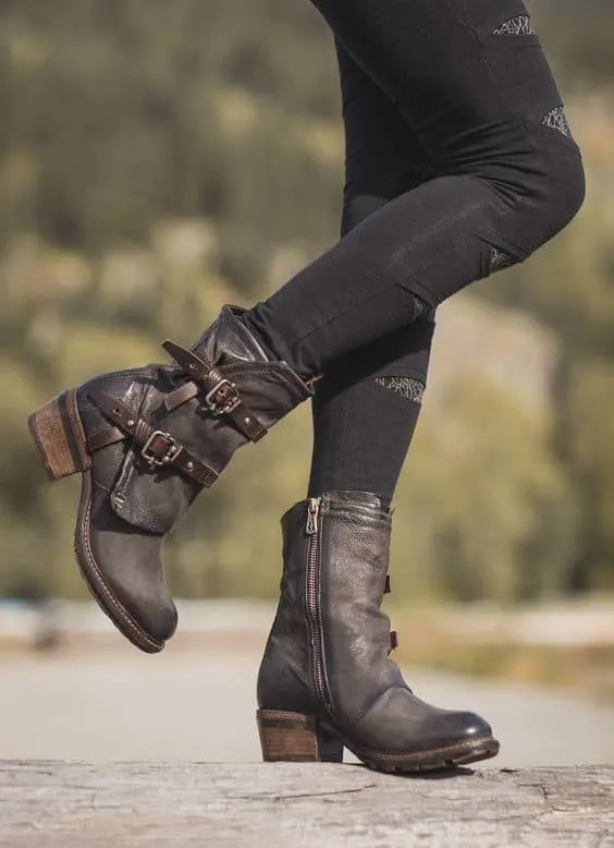 You. Want. These. A pair of over the ankle, motorcycle boots revamped in Mad Max style and serious comfort.