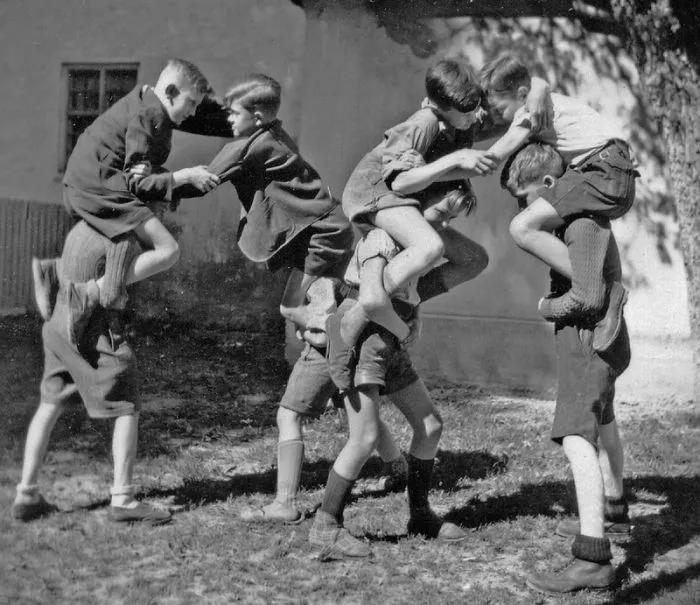 A Group Of Boys Aged Between 8 - 14 Out At Play