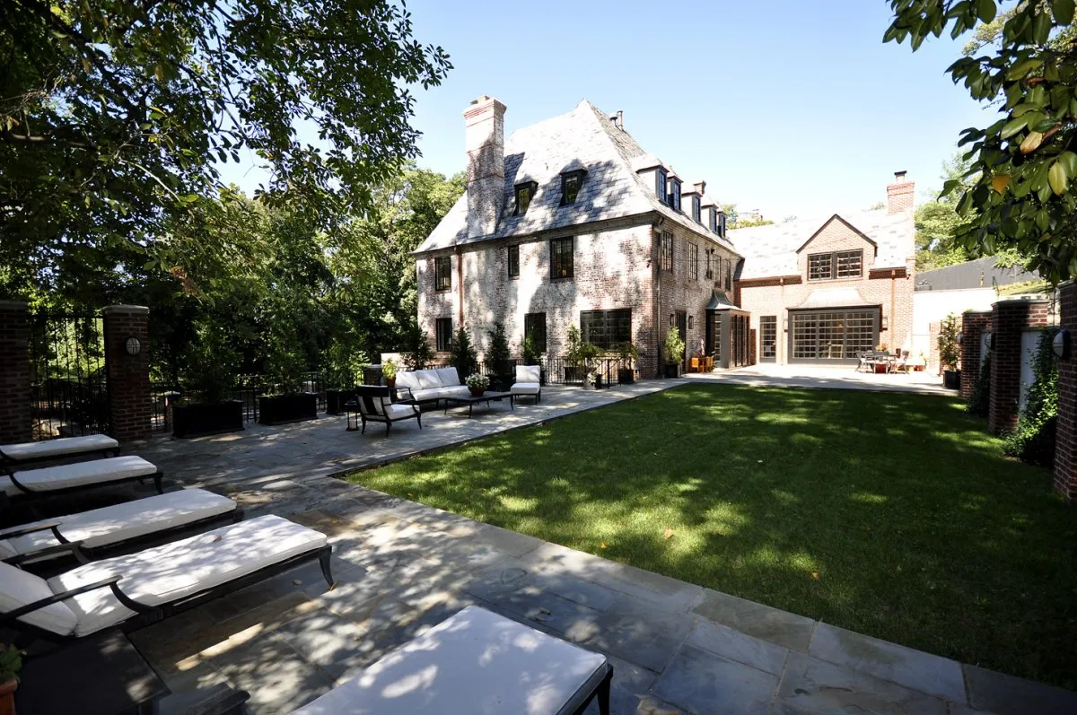 Out back, the neat garden has plenty of room for relaxing and sunning outdoors.