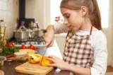 teen cutting pepper.jpg.653x0 q80 crop smart