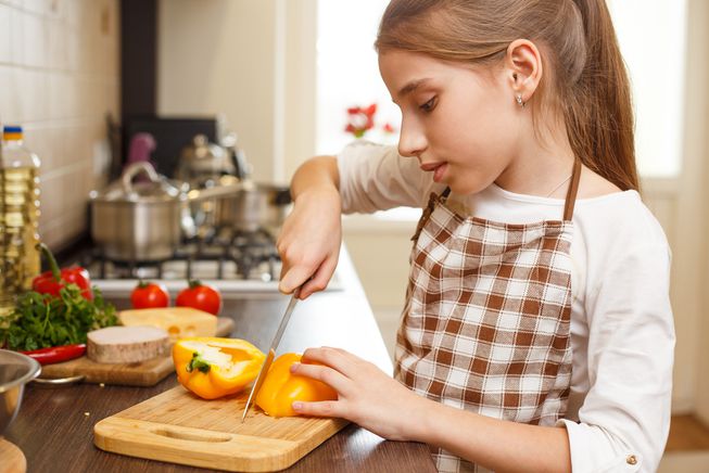 teen cutting pepper.jpg.653x0 q80 crop smart