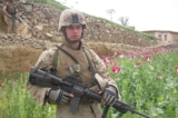 1280px US Army solder on a Poppy Field