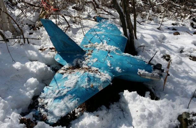 SAMCHEOK, SOUTH KOREA - APRIL 06: In this handout image provided by the South Korean Defence Ministry, the wreckage of a crashed drone is seen on a mountain on April 6, 2014 in Samcheok, South Korea. Three drones, believed to be North Korean, have been found in South Korea in recent weeks. (Photo by Handout/South Korean Defence Ministry via Getty Images)