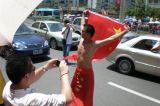 Naked guy 2008 Beijing Summer Olympics torch relay Shenzhen Guangdong Province P.R.China