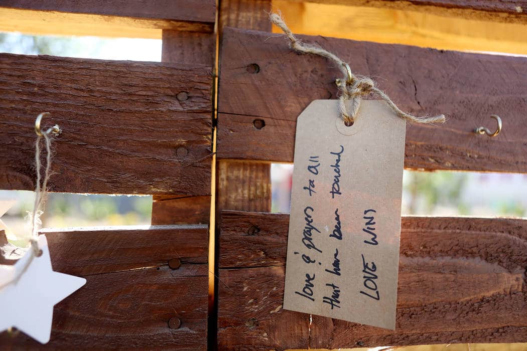 A tag in honor of the fallen victims is hung on a memorial wall apart of a new permanent garden being planted located on East Charleston Blvd. and South Casino Center Blvd. in Las Vegas, Thursday, ...