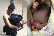 Viên cảnh sát cởi áo để bao bọc em bé sơ sinh bị bỏ rơi trong cái lạnh dưới 0 độ