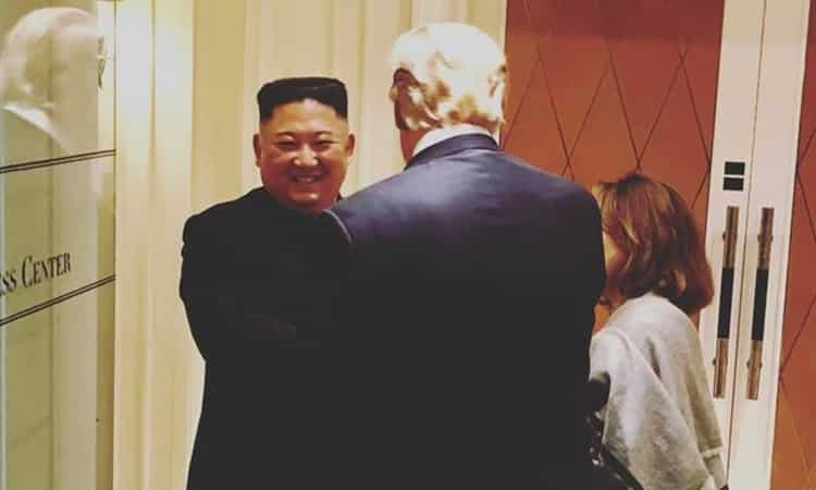 trump kim hand