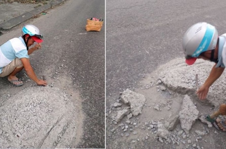 2 người thợ đục khối bêtông nằm giữa đường để dân không bị tai nạn