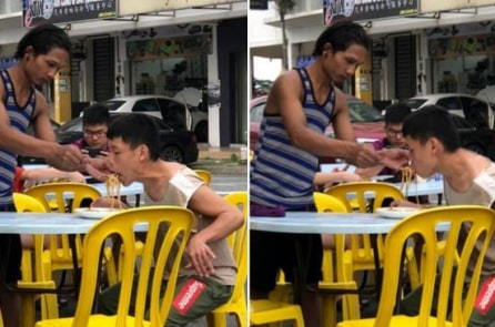 Cảm động người nhân viên đút cho khách hàng khuyết tật ăn