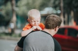 man carrying child 1361766