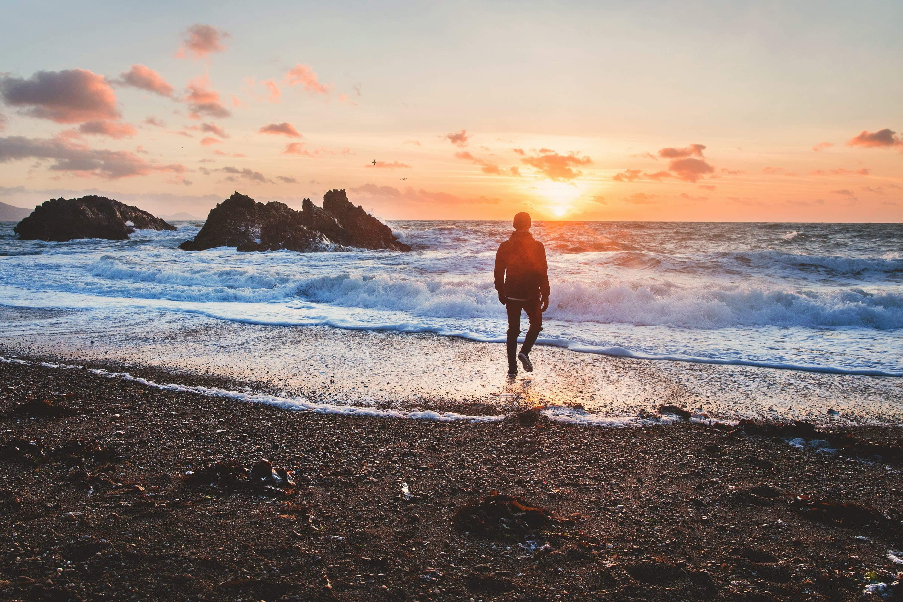 man walking beach image