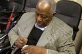 Hank Aaron signs an autograph before World Series Game 2. 30471993342