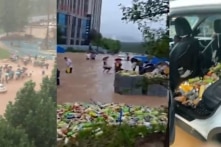 Trịnh Châu: Mưa lũ làm sập nhà kho, tranh cướp 300.000 chai nước giải khát