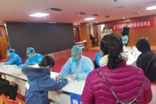 TQ: Công chức không tiêm vắc-xin COVID-19 bị đình chỉ lương, nghỉ làm