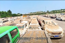 Chùm ảnh chụp bãi xe ô tô ngập nước ở Trịnh Châu tiết lộ điều gì?