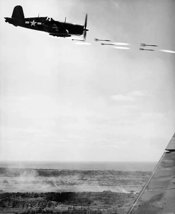 id13298022 Corsair fighter firing on Okinawa 600x733 1