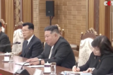 CCTV phát khoảnh khắc ông Kim Jong-un nhìn ông Tập Cận Bình với ánh nhìn chế giễu
